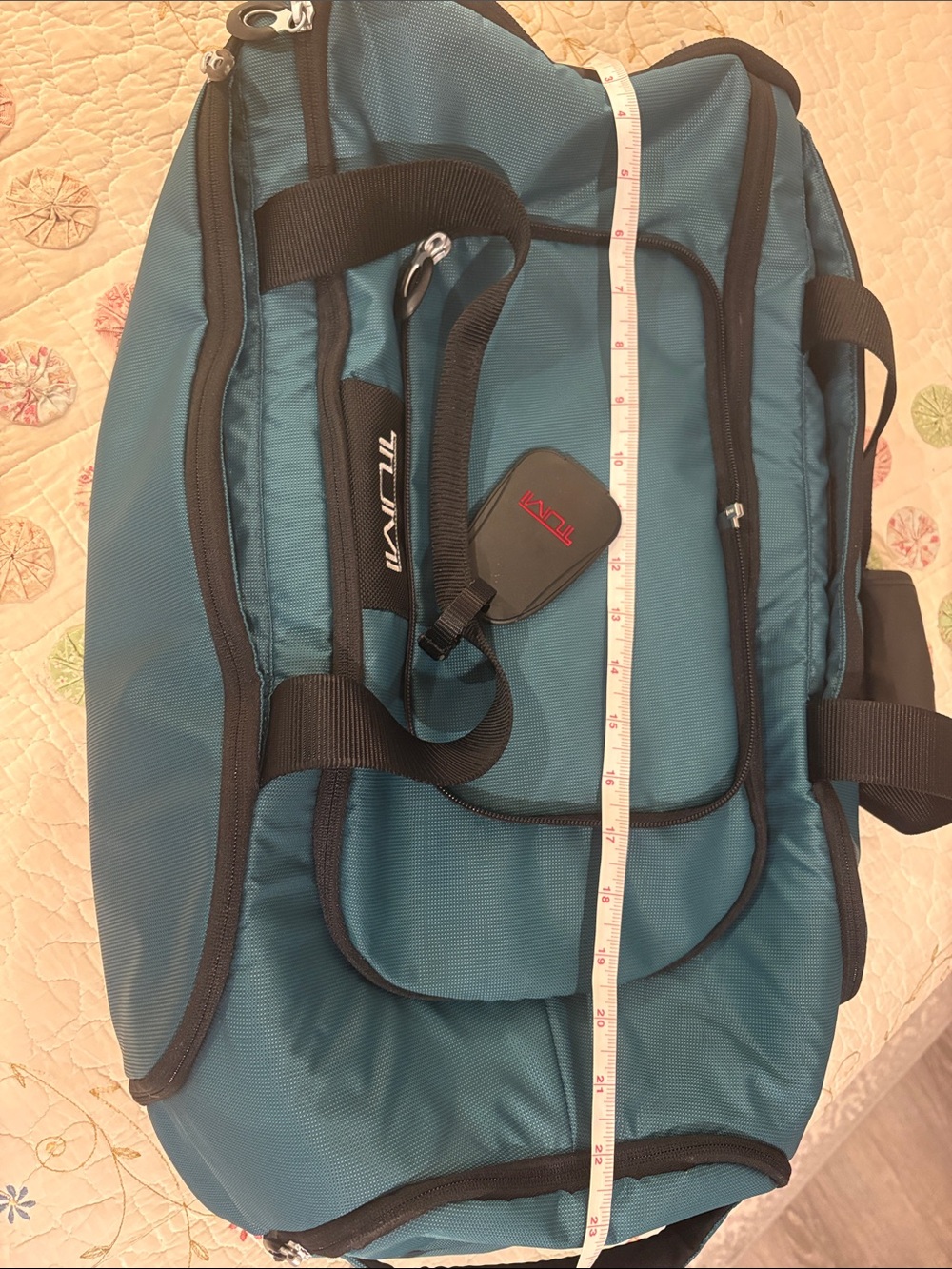 Tumi Teal Travel Duffel / backpack 
Very roomy to store things in very sturdy - Picture 12 of 13